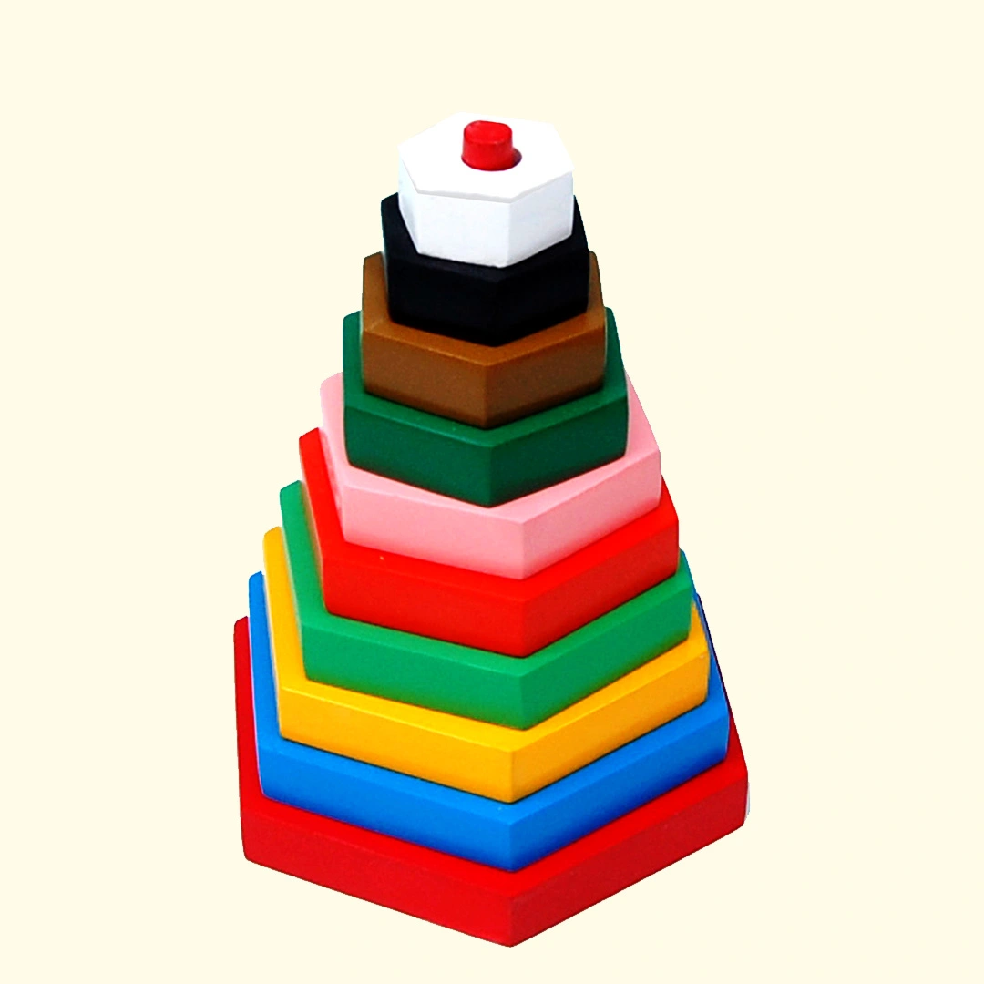 Wooden Building Blocks on green gradient background.